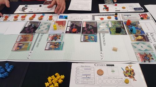 A very early Oath the Board Game prototype, laid out on a table with players engaged
