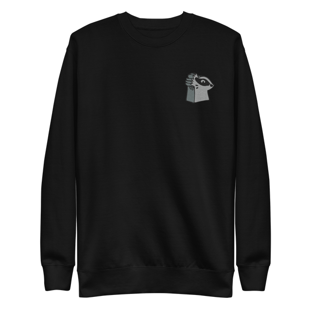 Black crewneck sweatshirt with the Keepers in Iron meeple embroidered on the left chest