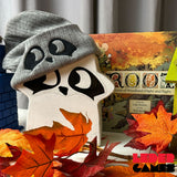 Oversized Root Vagabond meeple wearing Grey ribbed beanie with embroidered Raccoon eyes