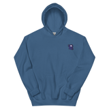 A blue hoodie with the Corvid Conspiracy meeple embroidered on the left chest.