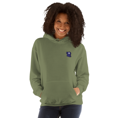 A model wearing an army green hoodie with the Corvid Conspiracy meeple embroidered on the left chest.