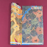 The swamp side of the playmat folded over to show the gorge map on the other side.
