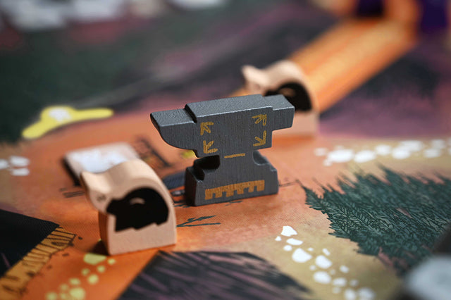 The Legendary Forge landmark meeple in-play on the mountain map