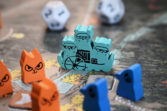The Riverfolk Flotilla hireling meeple in-play on the Root autumn board